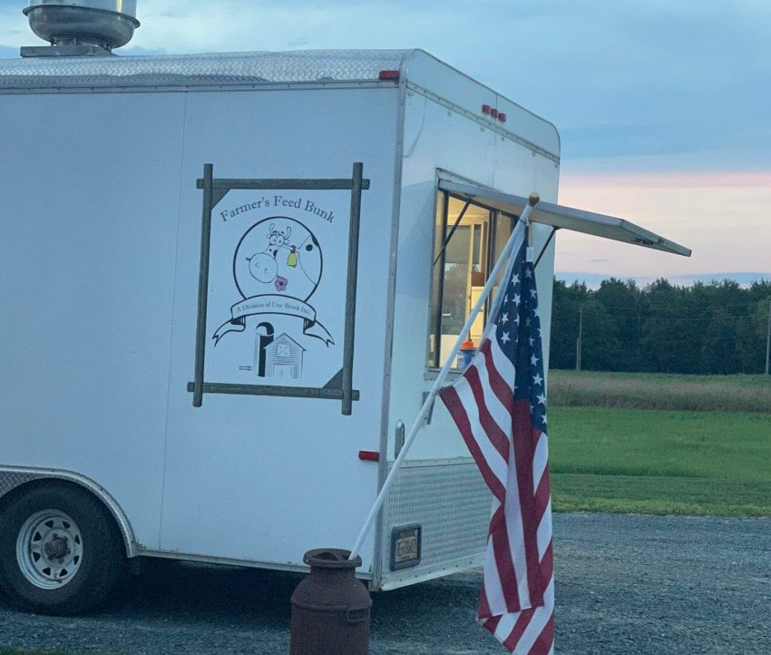 Famer's Feed Bunk food truck with American flag